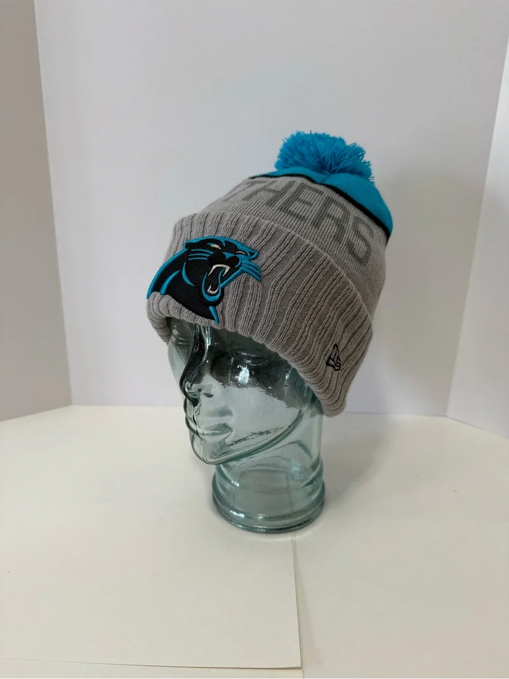 New Era Carolina Panthers NFL Gray and Teal Pom Beanie